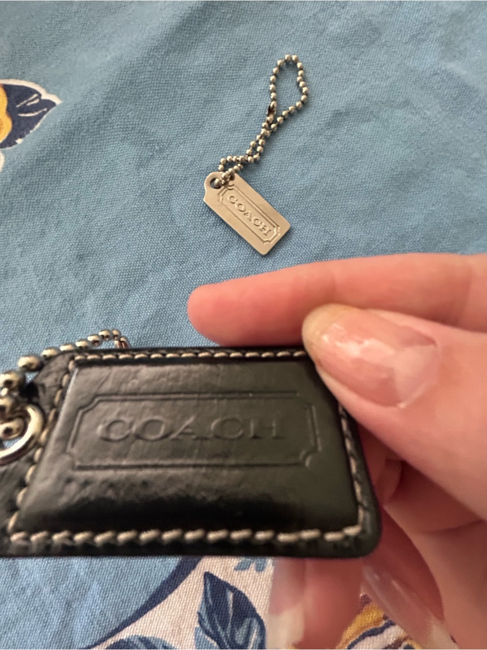 Set of two COACH tags